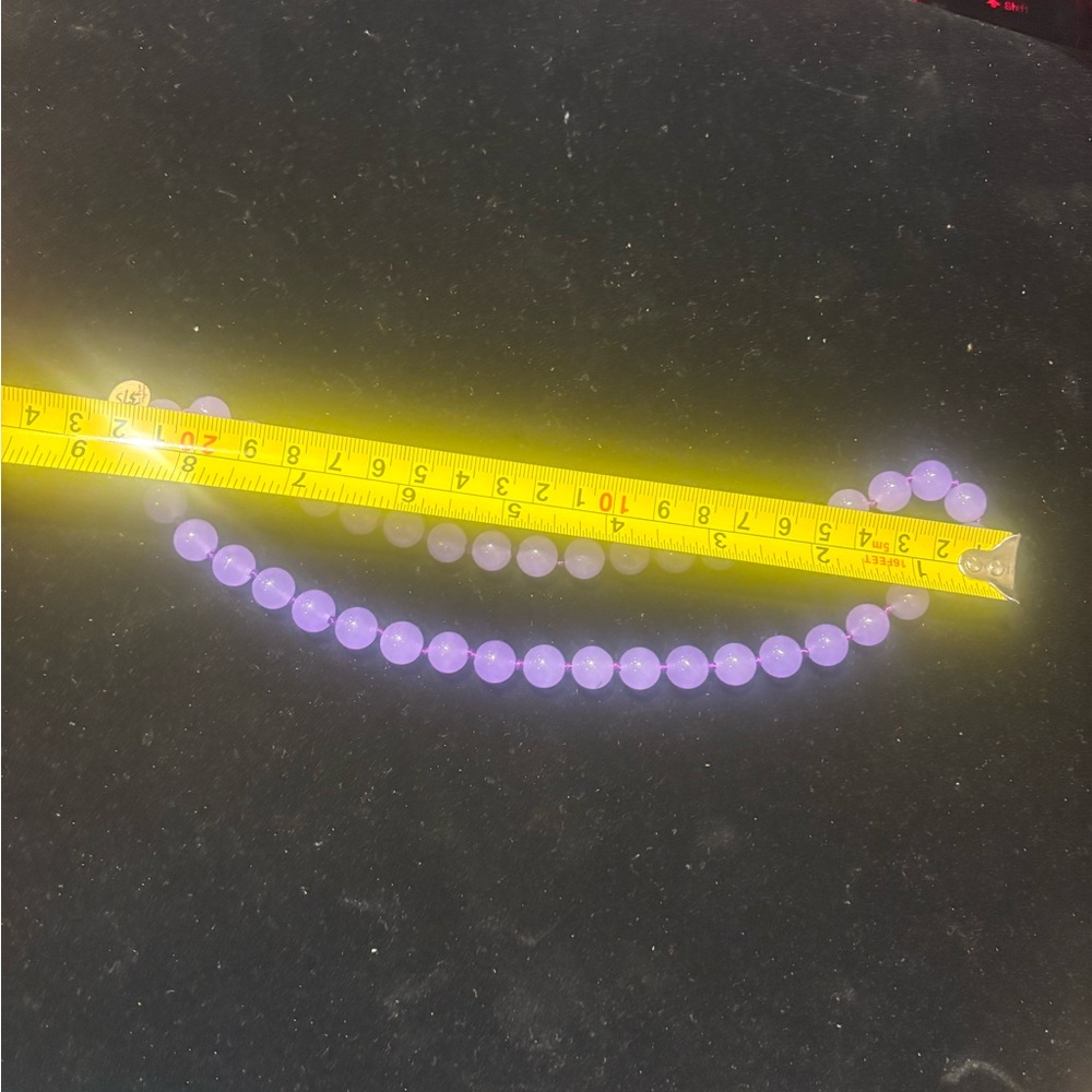 Purple Jade Necklace cold to touch does not burn